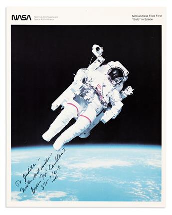 (ASTRONAUTS.) MCCANDLESS II, BRUCE. Two color Photographs Signed and Inscribed, each half-length portraits by NASA showing him in profi